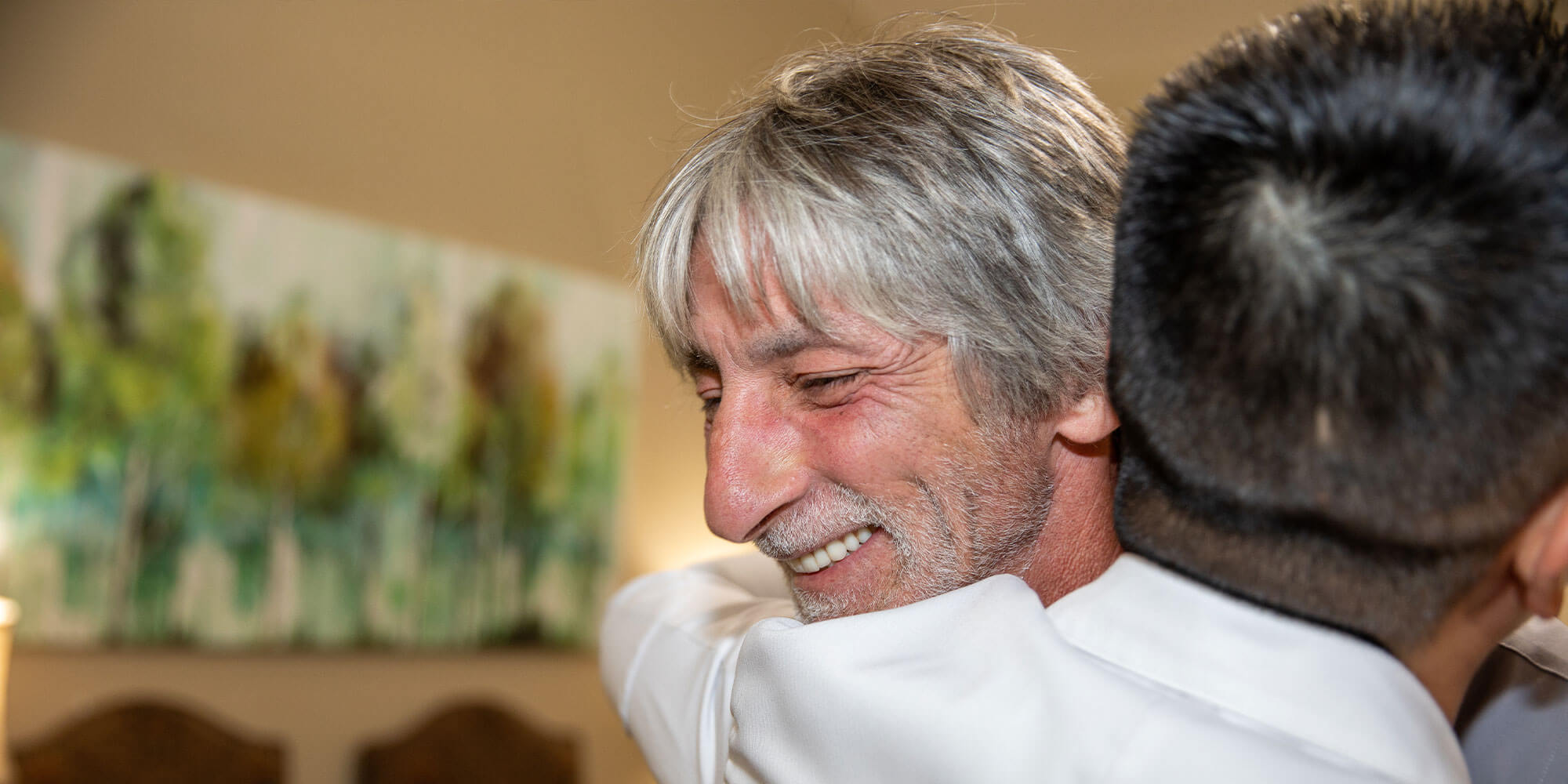 dental patient hugging doctor hua