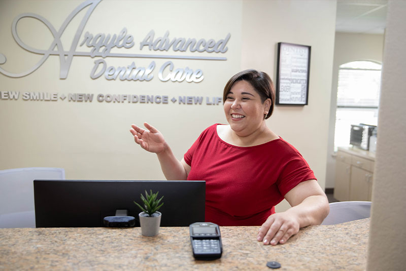 dental receptionist smiling